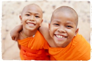 happy smile Novice monk in thailand temple